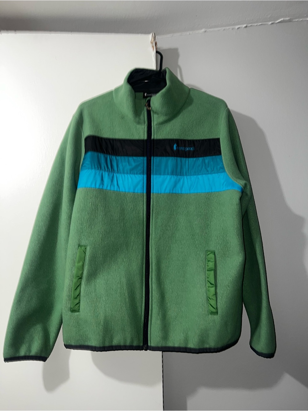 cotopaxi Light Green Fleece Jacket with Black and Bright Blue Stripes